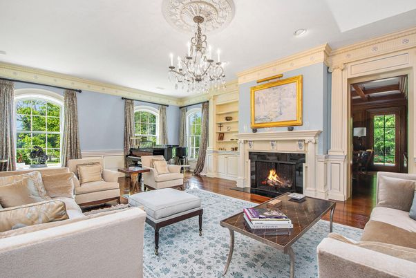 Chandelier, Fireplace, Interior, Living room, Piano, Recessed Lighting, Wood Texture Flooring