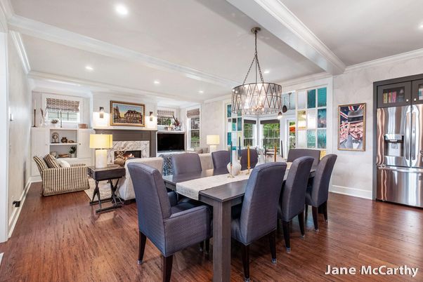 Chandelier, Dining room, Fireplace, Interior, Living room, Pendant Lights, Recessed Lighting, Stainless Steel Appliances, Wood Texture Flooring