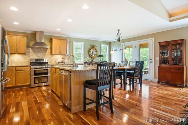 Dining room, Interior, Kitchen, Pendant Lights, Recessed Lighting, Stainless Steel Appliances, Wood Texture Flooring