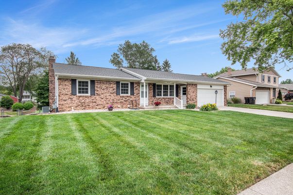 Attached, Backyard, Exterior, Facade, Brick Facade, Ranch