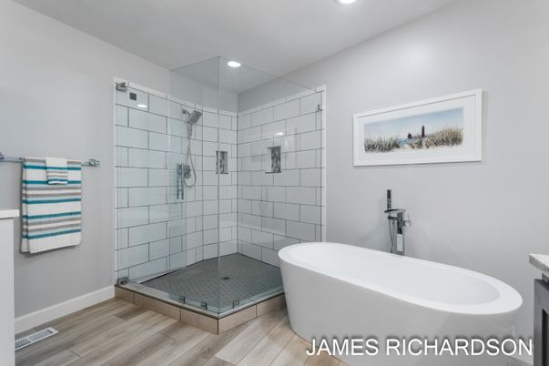 Bathroom, Free Standing Baths, Glass Shower, Interior, Recessed Lighting, Wood Texture Flooring