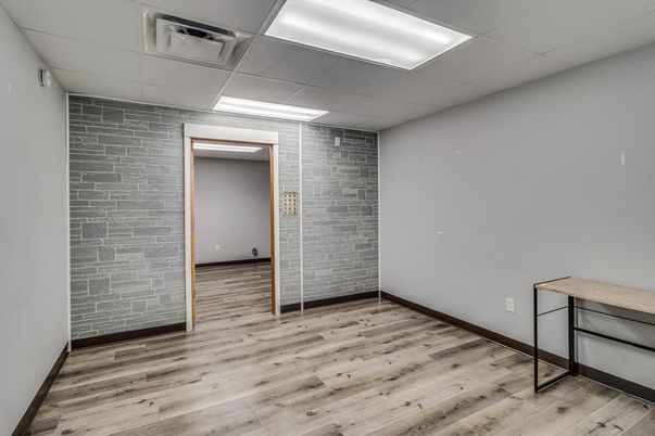 Empty room, Interior, Recessed Lighting, Stone Walls, Wood Texture Flooring