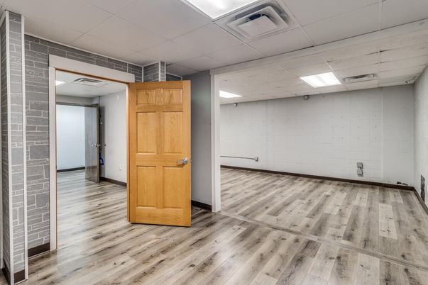 Empty room, Interior, Recessed Lighting, Stone Walls, Wood Texture Flooring