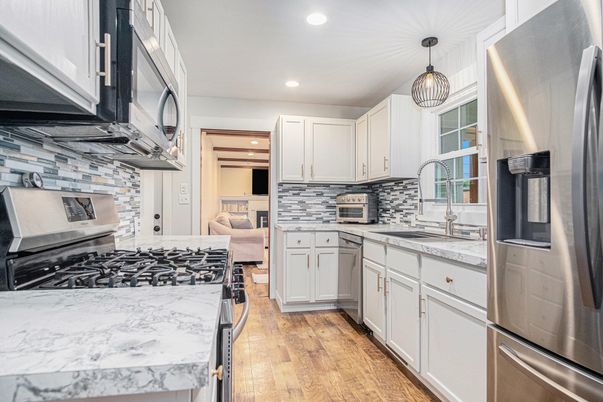 Interior, Kitchen, Pendant Lights, Recessed Lighting, Stainless Steel Appliances, Wood Texture Flooring