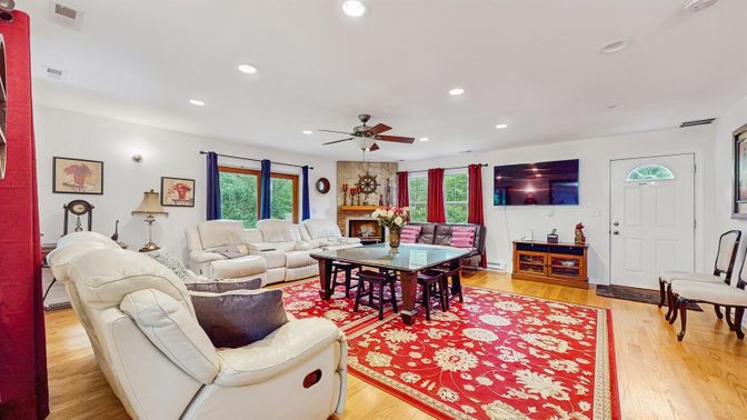 Dining room, Fireplace, Interior, Living room, Recessed Lighting, Wood Texture Flooring