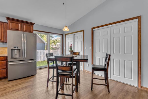 Dining room, Interior, Kitchen, Pendant Lights, Stainless Steel Appliances, Wood Texture Flooring