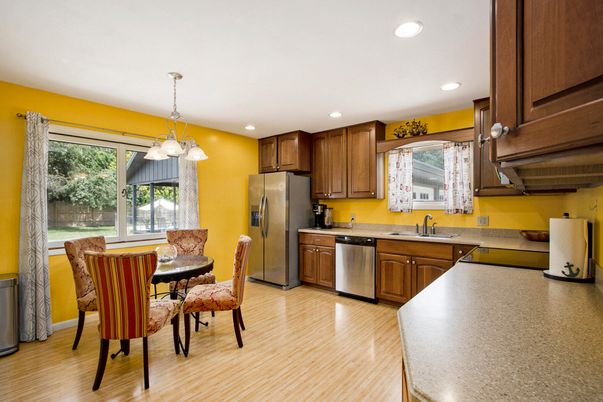 Dining room, Interior, Kitchen, Pendant Lights, Recessed Lighting, Stainless Steel Appliances, Wood Texture Flooring