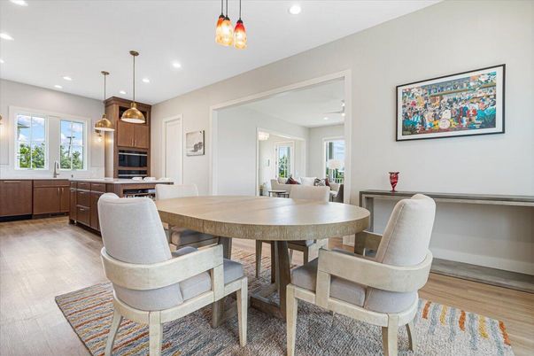 Dining room, Interior, Kitchen, Pendant Lights, Recessed Lighting, Stainless Steel Appliances, Wood Texture Flooring