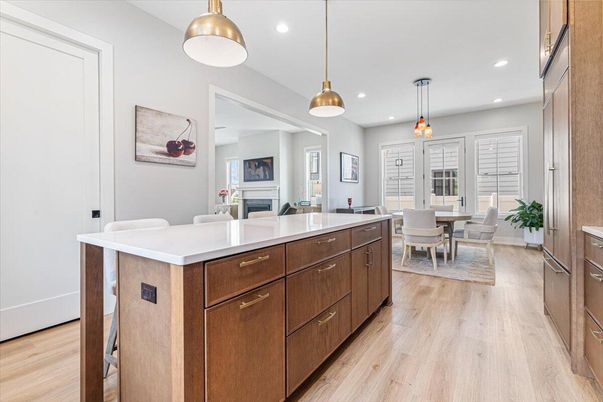 Dining room, Fireplace, Interior, Kitchen, Pendant Lights, Recessed Lighting, Wood Texture Flooring