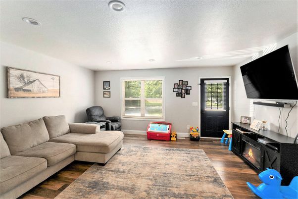 Fireplace, Interior, Living room, Recessed Lighting, Wood Texture Flooring