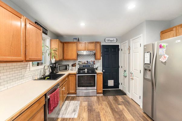 Interior, Kitchen, Recessed Lighting, Stainless Steel Appliances, Wood Texture Flooring