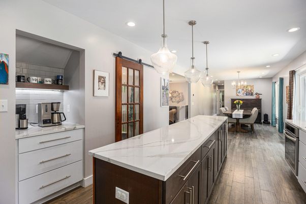 Chandelier, Dining room, Interior, Kitchen, Pendant Lights, Recessed Lighting, Stainless Steel Appliances, Wood Texture Flooring
