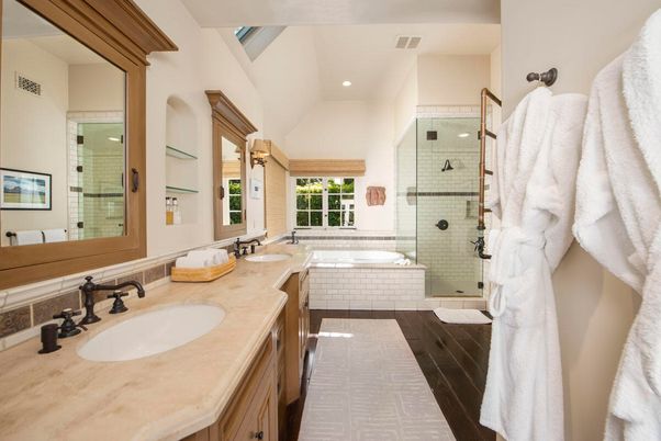 Bathroom, Dual Sink Vanities, Glass Shower, Interior, Recessed Lighting, Wood Texture Flooring