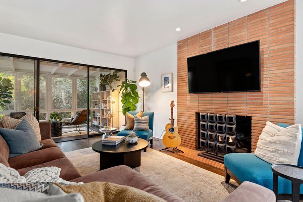 Fireplace, Interior, Living room, Recessed Lighting, Stone Walls, Wood Texture Flooring