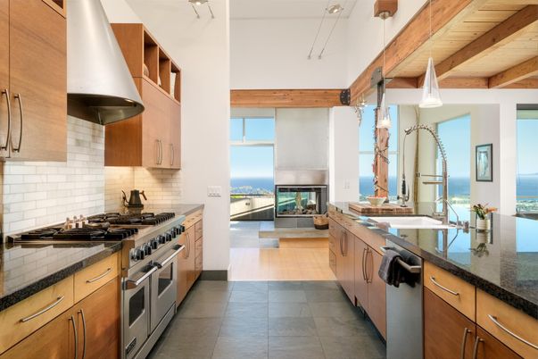 Fireplace, Interior, Kitchen, Living room, Pendant Lights, Stainless Steel Appliances, Water, Wooden Beams
