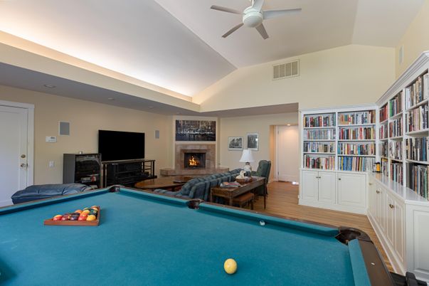 Billiard Table, Fireplace, Game Room, Interior, Living room, Recessed Lighting, Wood Texture Flooring