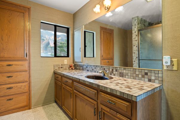 Bathroom, Dual Sink Vanities, Glass Shower, Interior, Tile Countertops