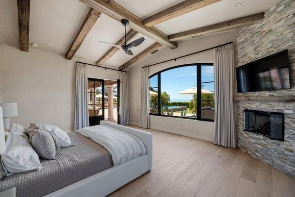 Bedroom, Fireplace, Interior, Recessed Lighting, Stone Walls, Wooden Beams, Wood Texture Flooring
