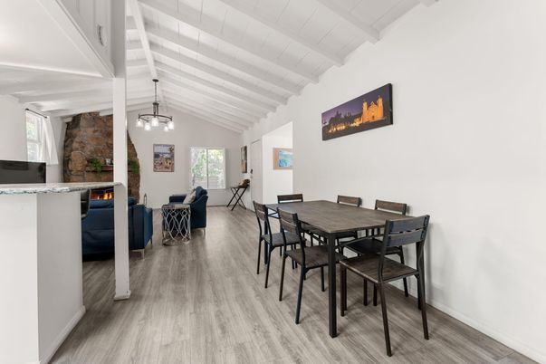 Dining room, Fireplace, Interior, Living room, Pendant Lights, Stone Walls, Wood Texture Flooring