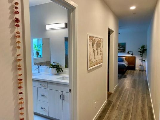 Bathroom, Dual Sink Vanities, Interior, Recessed Lighting, Wood Texture Flooring