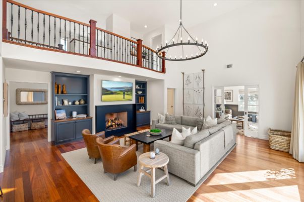 Chandelier, Fireplace, Interior, Living room, Pendant Lights, Recessed Lighting, Wood Texture Flooring