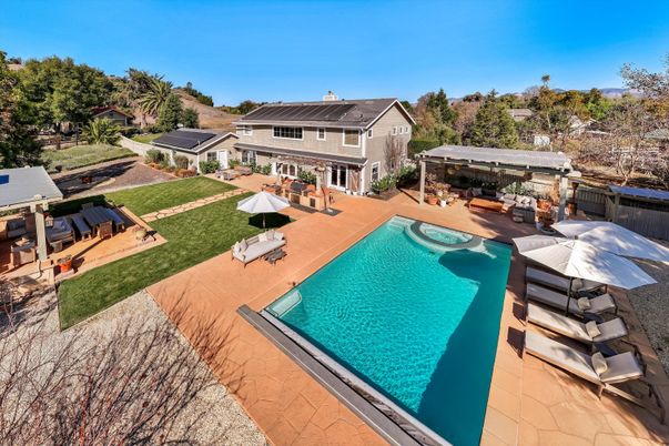 Exterior, Pool, Solar Panels