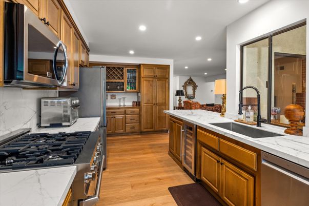 Interior, Kitchen, Recessed Lighting, Stainless Steel Appliances, Wood Texture Flooring