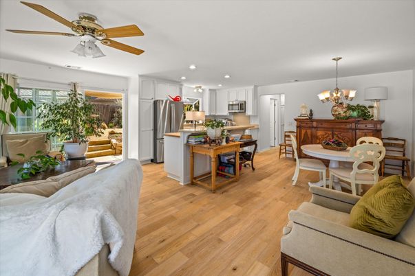Chandelier, Dining room, Interior, Kitchen, Recessed Lighting, Stainless Steel Appliances, Wood Texture Flooring