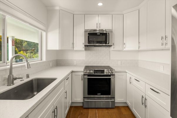 Interior, Kitchen, Recessed Lighting, Stainless Steel Appliances, Wood Texture Flooring