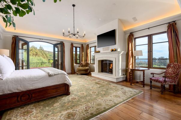 Bedroom, Chandelier, Fireplace, Interior, Recessed Lighting, Wood Texture Flooring