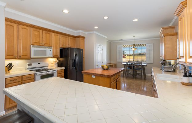 Dining room, Interior, Kitchen, Pendant Lights, Recessed Lighting, Stainless Steel Appliances, Tile Countertops