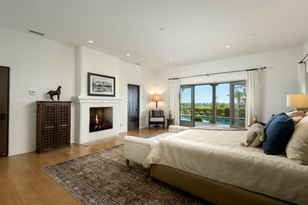 Bedroom, Fireplace, Interior, Recessed Lighting, Water, Wood Texture Flooring