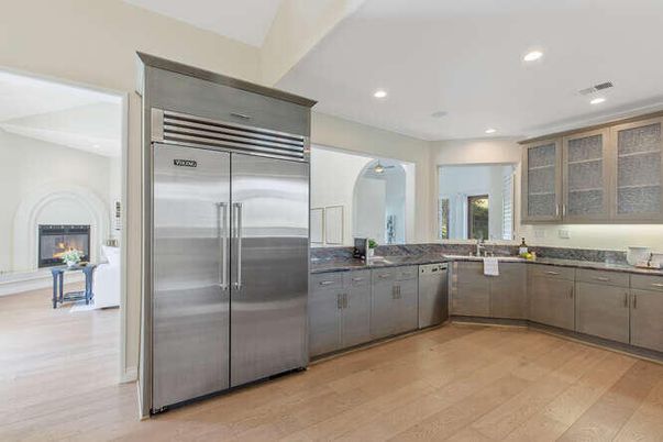 Fireplace, Interior, Kitchen, Recessed Lighting, Stainless Steel Appliances, Wood Texture Flooring