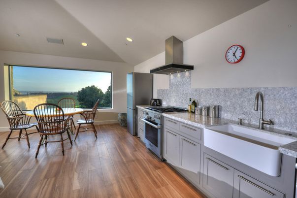 Dining room, Interior, Kitchen, Recessed Lighting, Stainless Steel Appliances, Wood Texture Flooring