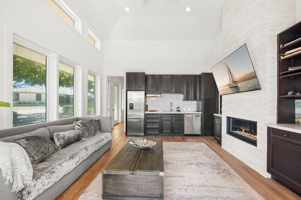 Fireplace, Interior, Kitchen, Living room, Recessed Lighting, Stainless Steel Appliances, Wood Texture Flooring