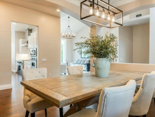Chandelier, Dining room, Interior, Kitchen, Pendant Lights, Recessed Lighting, Stainless Steel Appliances, Wood Texture Flooring