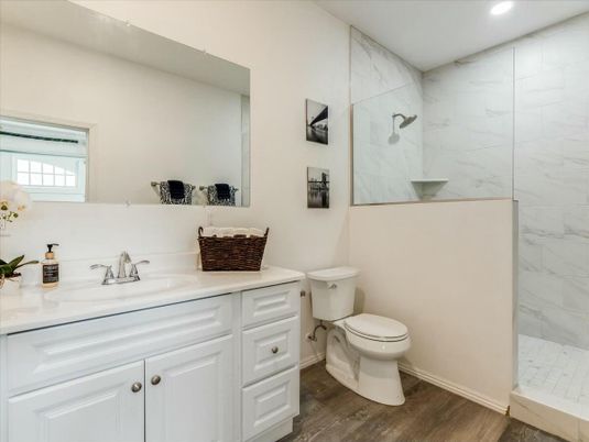 Bathroom, Glass Shower, Interior, Marble Walls, Recessed Lighting, Wood Texture Flooring