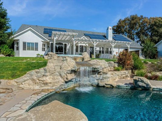 Exterior, Pool, Solar Panels