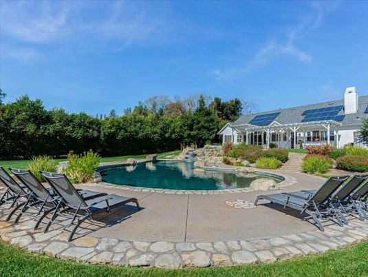 Exterior, Pool, Solar Panels