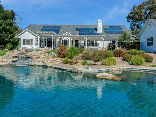 Exterior, Pool, Solar Panels