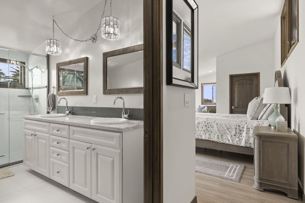 Bathroom, Bedroom, Dual Sink Vanities, Glass Shower, Interior, Pendant Lights, Wood Texture Flooring