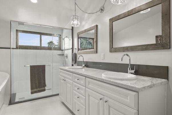 Bathroom, Dual Sink Vanities, Glass Shower, Interior, Pendant Lights, Recessed Lighting, Tile Countertops