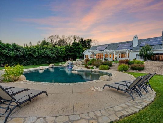 Exterior, Pool, Solar Panels