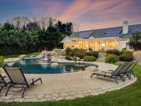 Exterior, Pool, Solar Panels