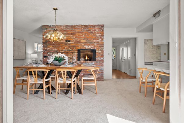 Dining room, Fireplace, Interior, Pendant Lights, Stone Walls, Wood Texture Flooring
