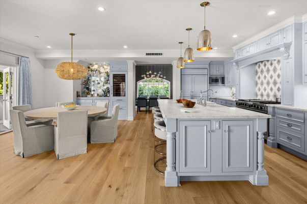 Chandelier, Dining room, Interior, Kitchen, Pendant Lights, Recessed Lighting, Stainless Steel Appliances, Wood Texture Flooring