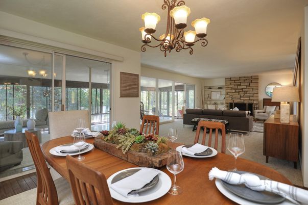 Chandelier, Dining room, Fireplace, Interior, Living room, Stone Walls, Wood Texture Flooring