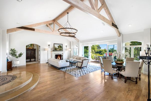Chandelier, Dining room, Fireplace, Interior, Living room, Pendant Lights, Recessed Lighting, Wooden Beams, Wood Texture Flooring