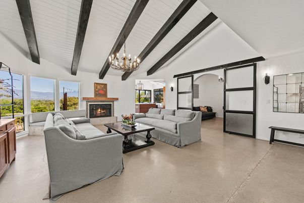 Chandelier, Fireplace, Interior, Living room, Wooden Beams