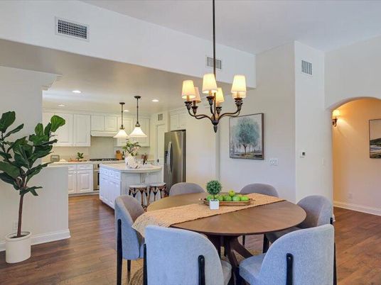 Chandelier, Dining room, Interior, Kitchen, Pendant Lights, Recessed Lighting, Stainless Steel Appliances, Wood Texture Flooring